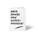 Vorderseite der geschlossenen A6 Glückwunschkarte von GHG Supplies mit dem dynamischen, schwarzen Schriftzug ABER SOWAS VON GLÜCKWUNSCH! im modernen Pinselstrich-Design auf weißem Grund.